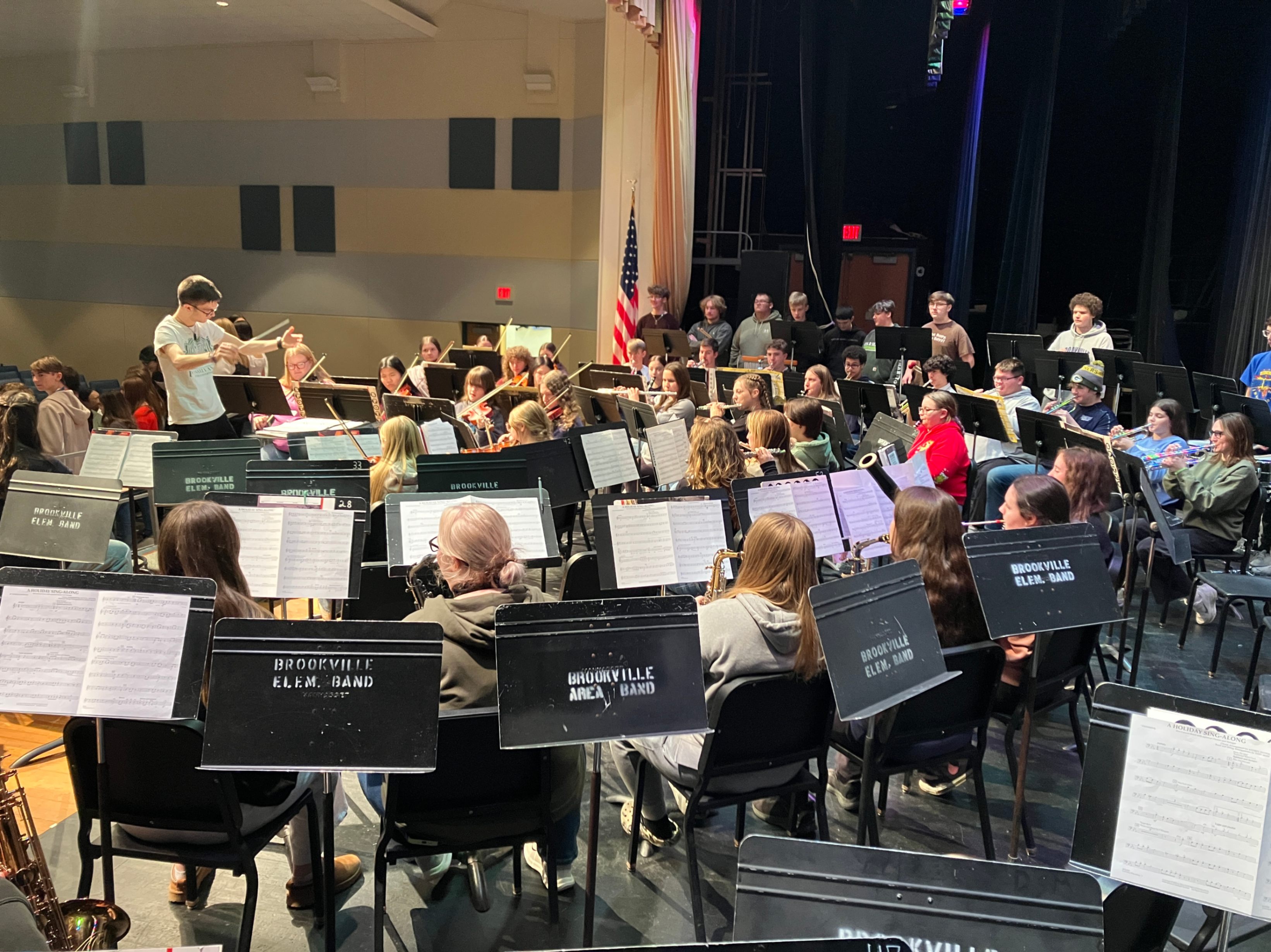 Sorren Morelli leads student musicians during practice.